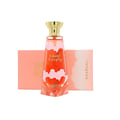 Khadlaj Cloud Candy Eau De Parfum 100ml — A clear glass perfume bottle with pink cloud designs and orange liquid, topped with a gold cap, sits in front of two peach-colored boxes with cloud motifs. | Khadlaj Cloud Candy Eau De Parfum 100ml — Botol kaca jernih dengan rekaan awan merah jambu dan cecair oren, di atasnya