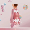 Khadlaj Cloud Candy Eau De Parfum 100ml by Khadlaj — A pink faceted perfume bottle with white cloud designs and a gold cap, surrounded by colorful lollipops and marshmallow candy on a pink background. | Khadlaj Cloud Candy Eau De Parfum 100ml by Khadlaj — Botol minyak wangi merah jambu berbentuk faset dengan rekaan