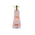 Khadlaj Cloud Candy Eau De Parfum 100ml by Khadlaj — A tall, faceted glass perfume bottle with a pink liquid and white cloud-like designs, topped with a gold cap. | Khadlaj Cloud Candy Eau De Parfum 100ml by Khadlaj — Botol kaca berfaset tinggi dengan cecair merah jambu dan reka bentuk seperti awan putih, di atasnya
