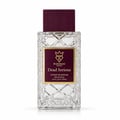 Bujairami Dead Serious by Bujairami 100ml Extrait Unisex — Clear faceted glass perfume bottle with a deep red textured cap and a rectangular label featuring a gold crown logo and "Dead Serious" text.