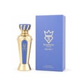 Bujairami Drip No. 7 100ml EDP — Gold and blue perfume bottle with ornate gold cap, standing next to its matching blue textured box with gold logo.