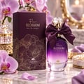 TADangel Fleur Blossom — Purple gradient perfume bottle with a satin bow, presented with its matching box adorned with gold floral patterns, surrounded by pink orchids on a marble surface.