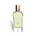 Maison Alhambra Glacier Heaven 100ml — A clear glass perfume bottle with light green liquid and a gold cap, featuring gold text and a deer logo on the label. | Maison Alhambra Glacier Heaven 100ml — Botol kaca jernih dengan cecair hijau muda dan penutup emas, menampilkan teks emas dan logo rusa pada label.