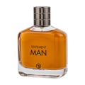 Grandeur Statement Man Eau De Parfum 100ml — A clear glass perfume bottle with amber liquid, a silver ribbed cap, and black text reading "STATEMENT MAN" and "GRANDEUR" logo. | Grandeur Statement Man Eau De Parfum 100ml — Botol minyak wangi kaca jernih dengan cecair berwarna ambar, penutup perak berjalur, dan teks