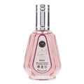 Ard Al Zaafaran Hareem Al Sultan EDP 50ml — Pink glass perfume bottle with a silver cap and a decorative label featuring Arabic script and "Hareem Al Sultan" text. | Ard Al Zaafaran Hareem Al Sultan EDP 50ml — Botol minyak wangi kaca merah jambu dengan penutup perak dan label hiasan yang menampilkan tulisan Arab dan