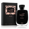 RASASI Hawas Black For Him oleh Rasasi 100ml EDP — Botol minyak wangi hitam dengan penutup bertekstur bersebelahan kotak cetakan ular hitam dan emas rosnya, kedua-duanya memaparkan logo Hawas Black.