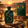 RASASI Hawas Boa by Rasasi 100ml EDP — Set botol dan kotak corak ular hijau berlatar lanskap gurun berbatu waktu matahari terbenam dengan tanglung berhias.