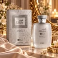 RASASI Hawas Crystelle by Rasasi 100ml EDP — Kotak dan botol corak retak perak dengan cermin emas berhias dan bunga di latar belakang