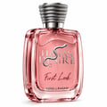 Kenz de Rasasi Hawas Desire First Look — Botol minyak wangi kaca merah jambu dengan lambang ular perak dan penutup perak bertekstur, di latar belakang putih.