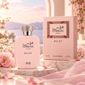 RASASI Hawas Eclat by Rasasi 100ml EDP — A light pink perfume bottle with a crystal-embellished cap and the brand name in Arabic and English, placed next to its matching pink box on a marble surface, surrounded by delicate pink flowers and petals.