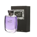 Rasasi Hawas For Him Eau De Parfum 100ml by Rasasi — A clear glass perfume bottle with purple liquid and a textured silver cap, placed next to its black textured box with a snake-skin pattern detail. | Rasasi Hawas For Him Eau De Parfum 100ml by Rasasi — Botol kaca jernih berisi cecair ungu dan penutup perak