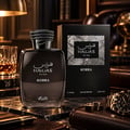RASASI Hawas Kobra by Rasasi 100ml EDP — Dark glass perfume bottle with textured snake-like cap, alongside its black box, a glass of amber liquid, and men's accessories on a marble surface.