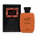 RASASI Hawas Overdose by Rasasi 100ml EDP — Black textured box with orange patterned insert next to an orange perfume bottle with a black textured cap, on a white background.