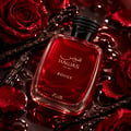 RASASI Hawas Rouge by Rasasi 100ml EDP — Red glass perfume bottle surrounded by red rose petals, vanilla pods, and dark liquid.