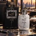 RASASI Hawas Thunder by Rasasi 100ml EDP — Black lightning-patterned box and silver bottle with lightning design, set on a marble surface with a passport and pen in the foreground, city skyline in background.