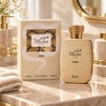 RASASI Hawas Viper by Rasasi 100ml EDP — Botol dan kotak emas bertekstur ular, dipamerkan di atas permukaan marmar bersama dispenser sabun emas dan tuala