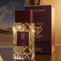 Bujairami Imperial Oud by Bujairami 100ml Extrait — Clear faceted glass bottle with gold accents and a deep purple label, next to its matching deep purple presentation box with gold crown logo, set against a desert landscape background with smoke wisps.