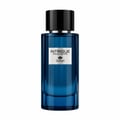 TADangel Intrigue Pour Homme oleh TADangel 100ml EDP Lelaki — Botol minyak wangi kaca biru dengan penutup hitam, label putih tertulis 'INTRIGUE POUR HOMME' dan lambang kecil, di latar belakang putih.