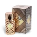 Ard Al Zaafaran Jazzab Gold Eau De Parfum 100ml — A gold-colored perfume bottle with a diamond-patterned cage sits next to its matching gold and brown patterned box on a white background. | Ard Al Zaafaran Jazzab Gold Eau De Parfum 100ml — Botol minyak wangi berwarna emas dengan sangkar bermotif berlian duduk