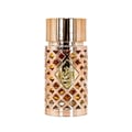 Ard Al Zaafaran Jazzab Gold by Ard Al Zaafaran Eau De Parfum 100ml — A close-up shot of a gold and rose gold perfume bottle with a diamond-patterned exterior and a central ornate gold emblem. | Ard Al Zaafaran Jazzab Gold by Ard Al Zaafaran Eau De Parfum 100ml — Gambar jarak dekat botol minyak wangi emas dan emas ros