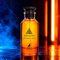 Maison Alhambra Jean Lowe Summer Vibes — A clear glass perfume bottle with amber liquid, a black cap, and a label featuring a tree logo, deer silhouette, and text, set against a dark background with blue smoke on the left and vertical orange lights on the right. | Maison Alhambra Jean Lowe Summer Vibes — Botol kaca