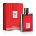 Karus Oud Fire by Khadlaj — Red textured box and rectangular red glass perfume bottle with silver ribbed cap and silver trim, set against a white background.