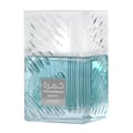 Lattafa Khamrah Waha Lattafa Perfumes 100ml EDP — A square, light blue glass perfume bottle with a textured, faceted design and a clear, ribbed cap, featuring a silver label with Arabic and English text. | Lattafa Khamrah Waha Lattafa Perfumes 100ml EDP — Botol minyak wangi kaca segi empat berwarna biru muda dengan