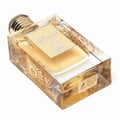 Maison Alhambra Kismet for Women 100ml — A rectangular glass perfume bottle with gold decorative patterns and a gold cap, filled with golden liquid. | Maison Alhambra Kismet for Women 100ml — Botol kaca berbentuk segi empat dengan corak hiasan emas dan penutup emas, diisi dengan cecair keemasan.