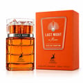 Maison Alhambra Last Night in Miami by Maison Alhambra 100ml Unisex — Amber liquid perfume bottle with a clear faceted cap and silver band, next to an orange box with white text and graphics.