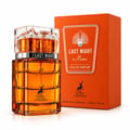 Maison Alhambra Last Night in Miami Eau de Parfum — Amber glass perfume bottle with a clear faceted cap and silver band, next to its orange presentation box with a sunburst design.