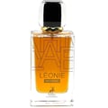 Maison Alhambra Leonie Intense — A clear glass perfume bottle with amber liquid, featuring a black and gold cap and a geometric pattern on the front. A small deer silhouette is printed above the brand name. | Maison Alhambra Leonie Intense — Botol kaca jernih dengan cecair ambar, menampilkan penutup hitam dan emas