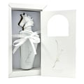 Lattafa Maahir Honor 100ml by Lattafa — White perfume bottle with a horse head stopper, tied with a white ribbon, inside a white box with an open flap revealing Arabic calligraphy and brand name. | Lattafa Maahir Honor 100ml oleh Lattafa — Botol minyak wangi putih dengan penyumbat kepala kuda, diikat dengan reben