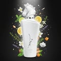 Lattafa Maahir Honor 100ml by Lattafa — White perfume bottle with a horse head cap, surrounded by scattered citrus slices, herbs, flowers, and amber chunks against a dark background. | Lattafa Maahir Honor 100ml by Lattafa — Botol minyak wangi putih dengan penutup kepala kuda, dikelilingi oleh hirisan sitrus, herba