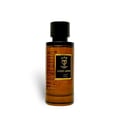 Bujairami Mad Love 100ml Extrait Unisex — Amber glass perfume bottle with a black cap and a black and gold label featuring a crown and the text 'Mad Love'.