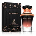 Maison Alhambra Mia Dolcezza — Black and rose gold gradient perfume bottle with ornate cap, next to a matching patterned gift box with a deer emblem.