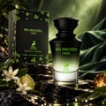 Maison Alhambra Mia Dolcezza Verde by Maison Alhambra 100ml EDP Unisex — Black box with green floral design and deer logo next to a gradient green glass perfume bottle with black cap, set on dark textured rocks with lime slices and white flowers