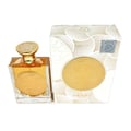 Ard Al Zaafaran Mithqal 100ml — A square glass perfume bottle with amber liquid and a gold ornate cap, next to its matching white and gold patterned box with a circular gold emblem. | Ard Al Zaafaran Mithqal 100ml — Botol minyak wangi kaca segi empat dengan cecair ambar dan penutup emas berhias, bersebelahan dengan