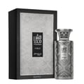 Zimaya Modhesh Noble 100ml — A silver patterned perfume box stands next to a matching silver patterned perfume bottle, both featuring Arabic script and text. | Zimaya Modhesh Noble 100ml — Kotak minyak wangi bercorak perak berdiri di sebelah botol minyak wangi bercorak perak yang sepadan, kedua-duanya menampilkan