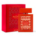 Rave Now Rouge Perfume EDP 100ml by RAVE — A red box with a geometric pattern sits next to an orange perfume bottle with a similar geometric cutout design. | Rave Now Rouge Perfume EDP 100ml by RAVE — Kotak merah dengan corak geometri terletak di sebelah botol minyak wangi oren dengan reka bentuk potongan geometri