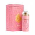 Zimaya Ode to Rose Royale Eau De Parfum 100ml — A pink perfume box with embossed gold rose design and text "Ode to Rose royale" sits next to a matching pink perfume bottle with a clear dome cap containing gold embellishments. | Zimaya Ode to Rose Royale Eau De Parfum 100ml — Kotak minyak wangi merah jambu dengan reka