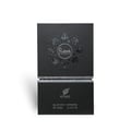 Afnan Rare Carbon — Black textured perfume box with a circular embossed design and silver lettering, showing the bottom part
