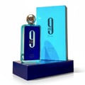 Afnan 9AM Dive by Afnan EDP 100 ml For Men — Botol minyak wangi biru terang dengan penutup emas berkilat, diletakkan di atas kotak biru gelap, dengan kotak produk biru terang di belakang.