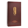 Afnan 9PM Elixir by Afnan 100ml EDP Men — Kotak wangian berwarna coklat gelap dengan reka bentuk bergaris menegak dan logo '9 PM ELIXIR' berwarna emas di bahagian hadapan. Terdapat tulisan 'AFNAN' dan maklumat produk di bahagian bawah.