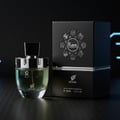 Afnan Rare Carbon — Black box with embossed circular design next to a clear glass perfume bottle with a black cap.