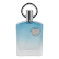 Afnan Supremacy In Heaven — Clear glass perfume bottle with blue to white gradient, silver cap and emblem, isolated on white.