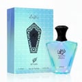 Afnan Turathi Electric by Afnan 90ml EDP Unisex — Kotak minyak wangi biru kehijauan dengan corak bertekstur dan botol kaca berwarna pelangi dengan penutup hitam, diletakkan bersebelahan di atas permukaan putih.
