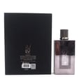 Al Wataniah Kayaan Classic by Al Wataniah Homme Intense 100ml For Man — Botol wangian Kayaan Classic dengan penutup kelabu metalik, diletakkan di sebelah kotak hitam yang memaparkan maklumat produk.