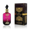 Al Wataniah Sabah Al Ward — Pink gradient glass perfume bottle with gold accents and black faceted cap, next to its matching