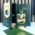 Armaf Feroce by Armaf 100ml EDP Women — Green box open, gold lion emblem bottle, and product card on white surface