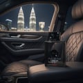 Armaf Club De Nuit Urban Elixir — Black perfume bottle on car armrest at night with city skyline background